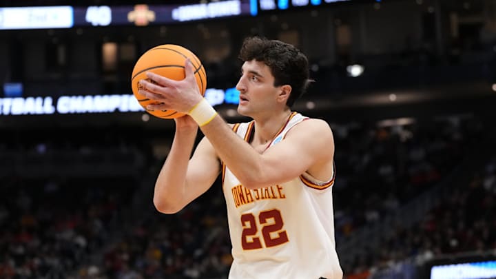 Mar 23, 2025; Milwaukee, WI, USA;  Iowa State Cyclones forward Milan Momcilovic (22) shoots against the Mississippi Rebels during the second half in the second round of the NCAA Tournament at Fiserv Forum. Mandatory Credit: Jeff Hanisch-Imagn Images