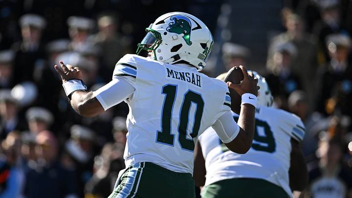 Nov 16, 2024; Annapolis, Maryland, USA; Tulane Green Wave quarterback Darian Mensah (10) drops back to pass during the first quarter against the Navy Midshipmen   at Navy-Marine Corps Memorial Stadium. Mandatory Credit: Tommy Gilligan-Imagn Images
