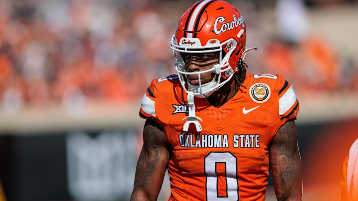 Oct 5, 2024; Stillwater, Oklahoma, USA; Oklahoma State Cowboys running back Ollie Gordon II (0) during a break in play in the first quarter against the West Virginia Mountaineers at Boone Pickens Stadium. Mandatory Credit: William Purnell-Imagn Images
