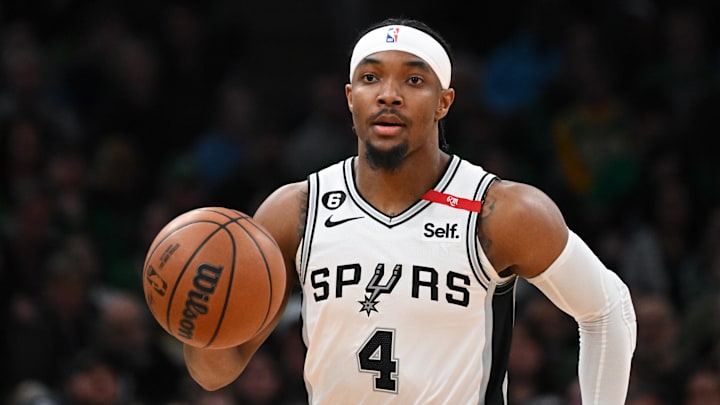 Mar 26, 2023; Boston, Massachusetts, USA; San Antonio Spurs guard Devonte' Graham (4) dribbles the ball against the Boston Celtics during the first quarter at the TD Garden. Mandatory Credit: Brian Fluharty-Imagn Images Mar 26, 2023; Boston, Massachusetts, USA; San Antonio Spurs guard Devonte' Graham (4) dribbles the ball against the Boston Celtics during the first quarter at the TD Garden. Mandatory Credit: Brian Fluharty-Imagn Images