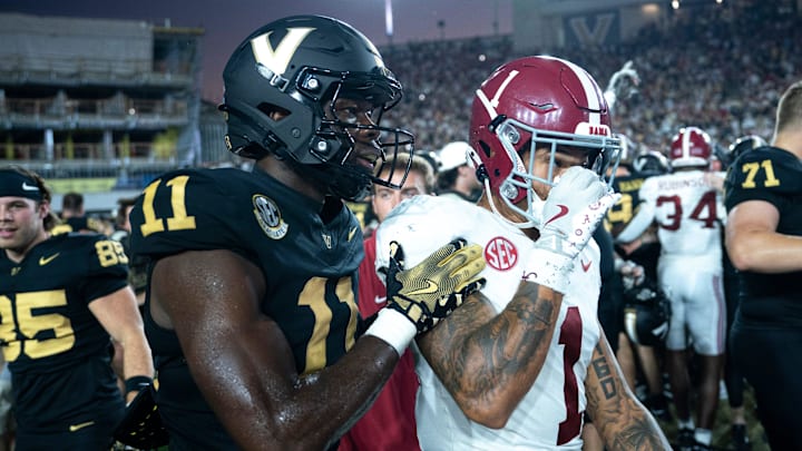 Vanderbilt Commodores wide receiver Loic Fouonji (11) talks with Alabama Crimson Tide defensive back Domani Jackson (1) after knocking off the Alabama Crimson Tide 40-35 at Vanderbilt Stadium in Nashville, Tenn., Saturday, Oct. 5, 2024.
