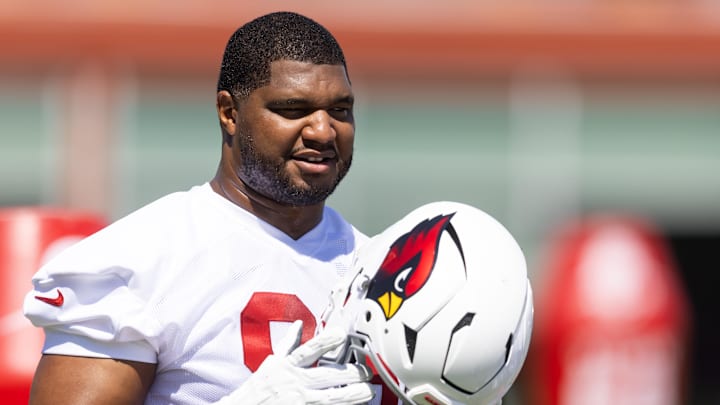 Jun 10, 2025; Tempe, AZ, USA; Arizona Cardinals defensive lineman Calais Campbell (93) holds his helmet during minicamp at the teams Arizona Cardinals Training Facility. Mandatory Credit: Mark J. Rebilas-Imagn Images