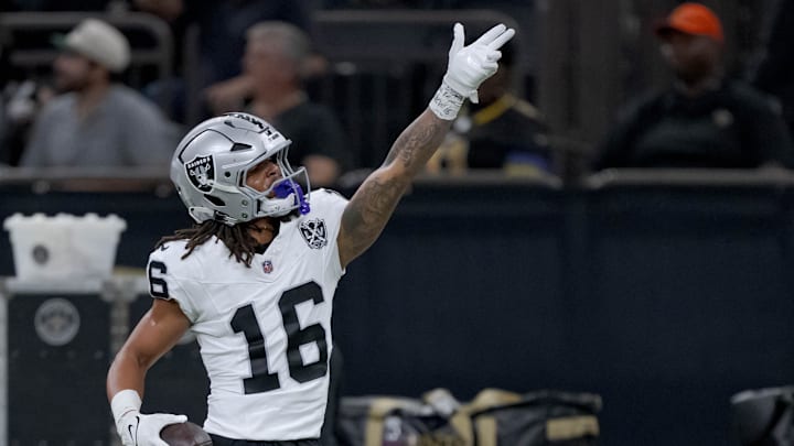 Dec 29, 2024; New Orleans, Louisiana, USA; Las Vegas Raiders wide receiver Jakobi Meyers (16) signals a first down against the New Orleans Saints at Caesars Superdome. Mandatory Credit: Matthew Hinton-Imagn Images