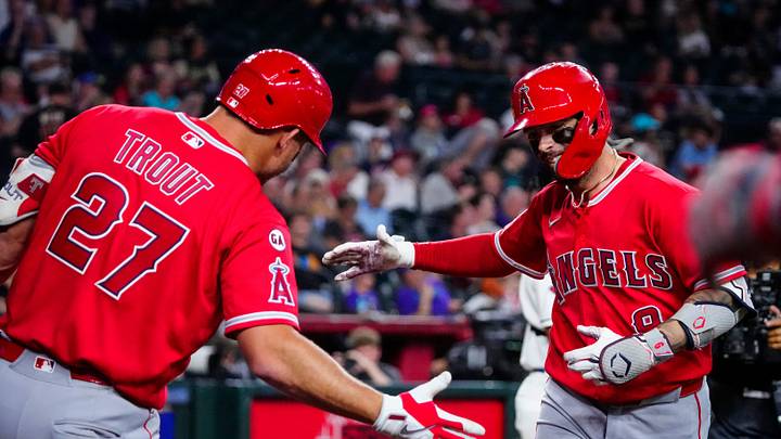 Angels shortstop Zach Neto (9) high-fives outfielder Mike Trout (27) after a solo home run against the Diamondbacks during a game at Chase Field in Phoenix, Ariz. on June 17, 2026. Angels shortstop Zach Neto (9) high-fives outfielder Mike Trout (27) after a solo home run against the Diamondbacks during a game at Chase Field in Phoenix, Ariz. on June 17, 2026.