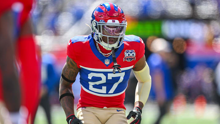 Sep 8, 2024; East Rutherford, New Jersey, USA; New York Giants safety Jason Pinnock (27) warms up before a game against the Minnesota Vikings at MetLife Stadium. Mandatory Credit: John Jones-Imagn Images