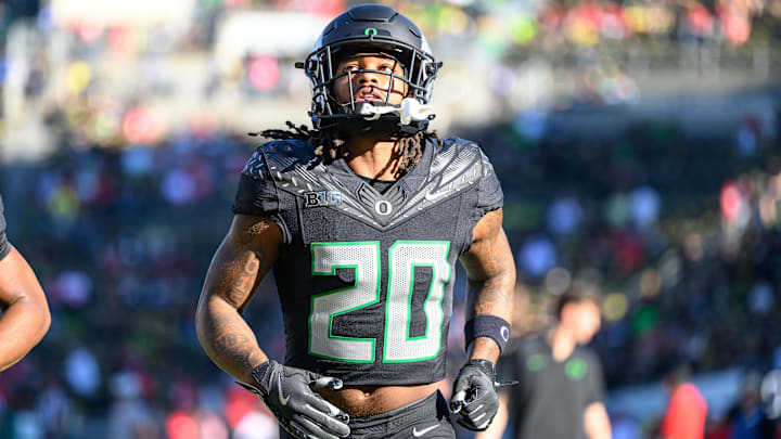 Oct 12, 2024; Eugene, Oregon, USA; Oregon Ducks running back Jordan James (20) warms up before the game against the Ohio State Buckeyes at Autzen Stadium. Mandatory Credit: Craig Strobeck-Imagn Images