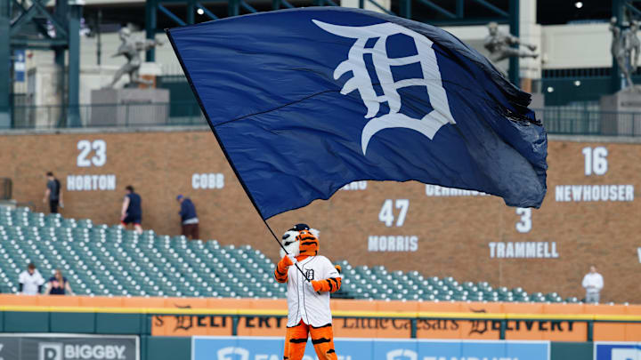 Detroit Tigers mascot Paws celebrates after the game. 