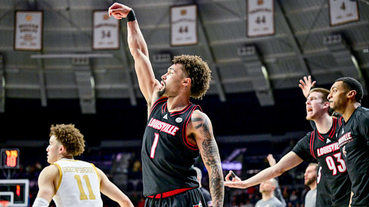 Feb 16, 2025; South Bend, Indiana, USA; Louisville Cardinals guard J'Vonne Hadley (1) watches his shot after shooting a three point basket in the second half against the Notre Dame Fighting Irish at the Purcell Pavilion. Louisville won 75-60. 