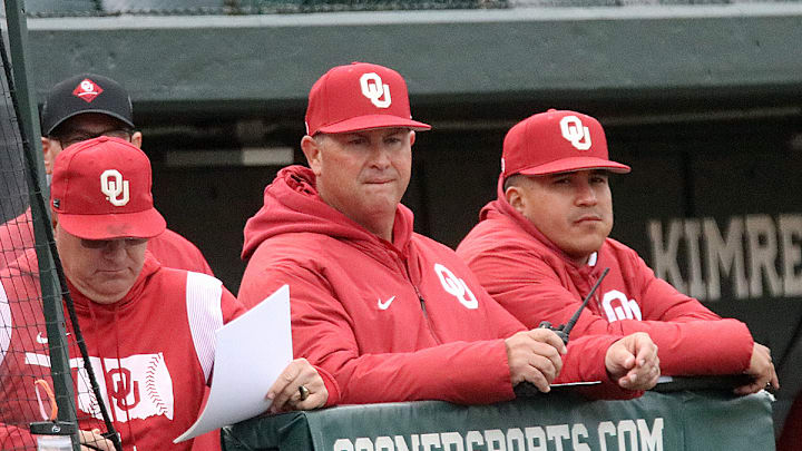 Oklahoma coach Skip Johnson (center) Oklahoma coach Skip Johnson (center)