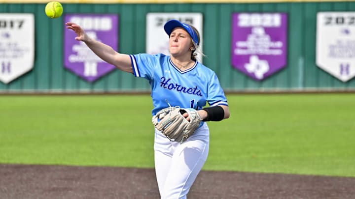 Hooks infielder Keeli Harris throws the ball during a game against Longview Pine Tree in a game on Feb. 27. 