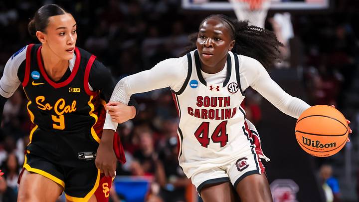 Mar 23, 2026; Columbia, South Carolina, USA; South Carolina Gamecocks guard Agot Makeer (44) drives around USC Trojans guard Jazzy Davidson (9) in the second half at Colonial Life Arena. Mandatory Credit: Jeff Blake-Imagn Images