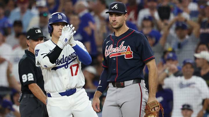 Oct 4, 2026; Los Angeles, California, USA; Los Angeles Dodgers designated hitter Shohei Ohtani (17) reacts behind Atlanta Braves first baseman Matt Olson (28) after a single during the fifth inning in game two of the NLDS for the 2026 MLB Playoffs at Uniqlo Field at Dodger Stadium. Mandatory Credit: Kiyoshi Mio-Imagn Images Oct 4, 2026; Los Angeles, California, USA; Los Angeles Dodgers designated hitter Shohei Ohtani (17) reacts behind Atlanta Braves first baseman Matt Olson (28) after a single during the fifth inning in game two of the NLDS for the 2026 MLB Playoffs at Uniqlo Field at Dodger Stadium. Mandatory Credit: Kiyoshi Mio-Imagn Images