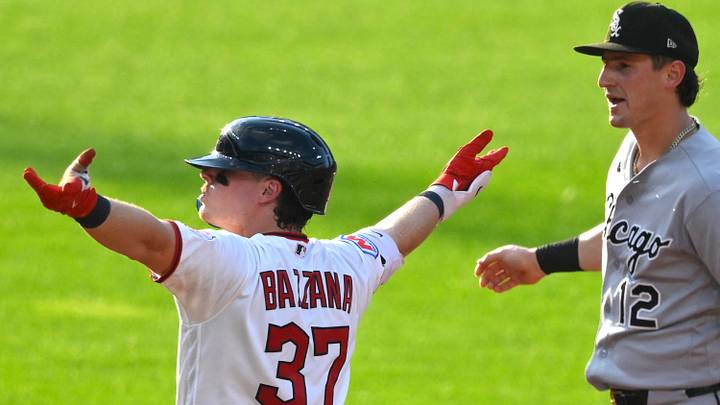 Jul 2, 2026: Cleveland Guardians second baseman Travis Bazzana (37) celebrates his  double beside Chicago White Sox shortstop Colson Montgomery (12) in the third inning at Progressive Field. 