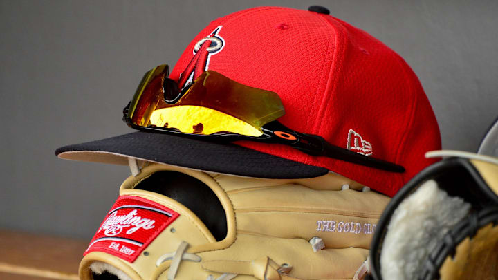 Mar 6, 2019; Salt River Pima-Maricopa, AZ, USA; General view of a Los Angeles Angels hat, glasses