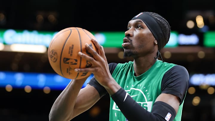 Nov 16, 2025; Boston, Massachusetts, USA; Boston Celtics center Chris Boucher (99) warms up before a game against the Los Angeles Clippers at TD Garden. Mandatory Credit: Paul Rutherford-Imagn Images