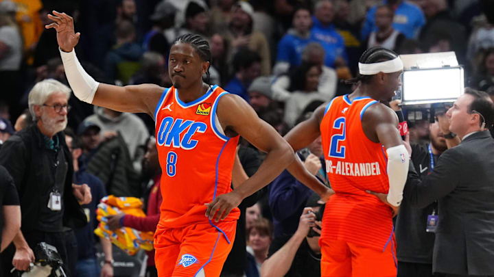 Dec 16, 2023; Denver, Colorado, USA; Oklahoma City Thunder forward Jalen Williams (8) and guard Shai Gilgeous-Alexander (2) celebrate after defeating the Denver Nuggets at Ball Arena. Mandatory Credit: Ron Chenoy-Imagn Images