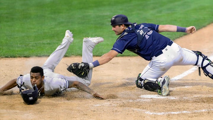 Hudson Valley's Alexander Vargas is tagged out by Wilmington catcher Caleb Farmer on a fourth-inning grounder as the Rocks played their infield in during the Blue Rocks' 6-3 loss at Frawley Stadium, Friday, August 4, 2023.