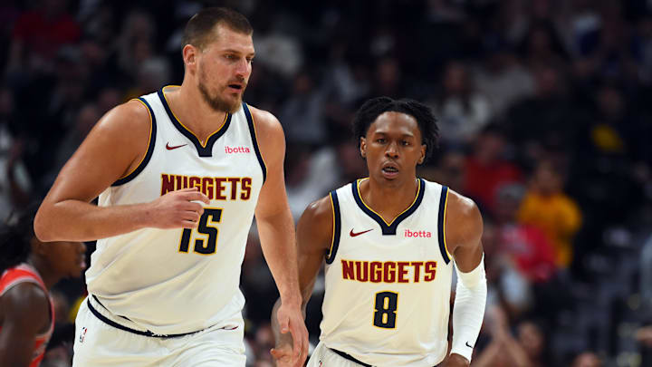 Oct 14, 2025; Denver, Colorado, USA; Denver Nuggets forward Peyton Watson (8) after scoring on an assist by center Nikola Jokic (15) during the first half at Ball Arena. Oct 14, 2025; Denver, Colorado, USA; Denver Nuggets forward Peyton Watson (8) after scoring on an assist by center Nikola Jokic (15) during the first half at Ball Arena.