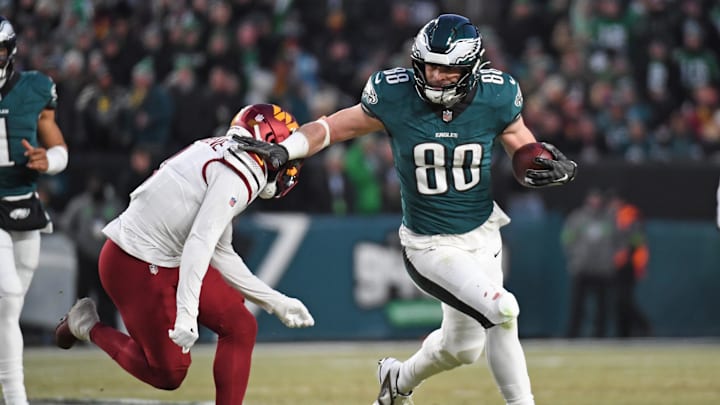 Jan 26, 2025; Philadelphia, PA, USA; Philadelphia Eagles tight end Dallas Goedert (88) tries to get past Washington Commanders cornerback Mike Sainristil (0) in the NFC Championship game at Lincoln Financial Field.