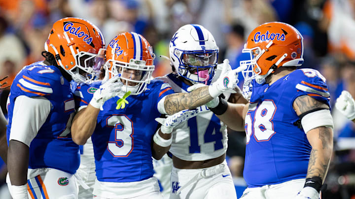 Oct 19, 2024; Gainesville, Florida, USA; Florida Gators wide receiver Eugene Wilson III (3) gestures with Florida Gators offensive lineman Knijeah Harris (77) and Florida Gators offensive lineman Austin Barber (58) after a first down against the Kentucky Wildcats during the first half at Ben Hill Griffin Stadium. Mandatory Credit: Matt Pendleton-Imagn Images Oct 19, 2024; Gainesville, Florida, USA; Florida Gators wide receiver Eugene Wilson III (3) gestures with Florida Gators offensive lineman Knijeah Harris (77) and Florida Gators offensive lineman Austin Barber (58) after a first down against the Kentucky Wildcats during the first half at Ben Hill Griffin Stadium. Mandatory Credit: Matt Pendleton-Imagn Images