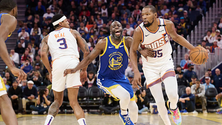 Dec 28, 2024; San Francisco, California, USA; Phoenix Suns forward Kevin Durant (35) dribbles the ball and guard Bradley Beal (3) sets a pick against Golden State Warriors forward Draymond Green (23) during the third quarter at Chase Center. Mandatory Credit: Robert Edwards-Imagn Images Dec 28, 2024; San Francisco, California, USA; Phoenix Suns forward Kevin Durant (35) dribbles the ball and guard Bradley Beal (3) sets a pick against Golden State Warriors forward Draymond Green (23) during the third quarter at Chase Center. Mandatory Credit: Robert Edwards-Imagn Images