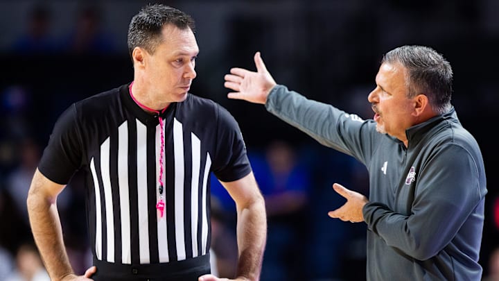 Mississippi State Bulldogs head coach Chris Jans has words with an official in the first half. The