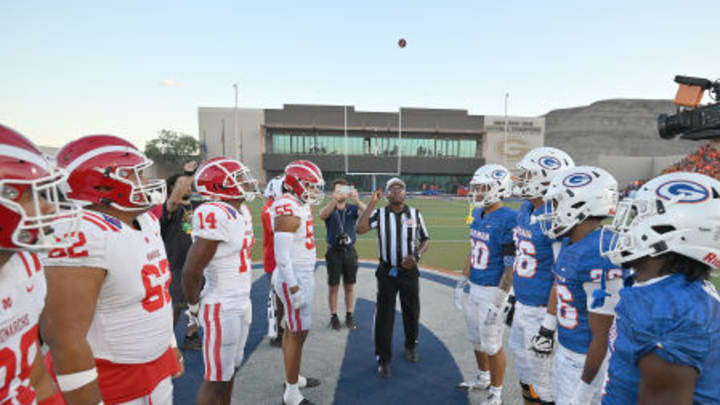 Mater Dei and Bishop Gorman face off for the coin flip before a 2022 game in Las Vegas. 