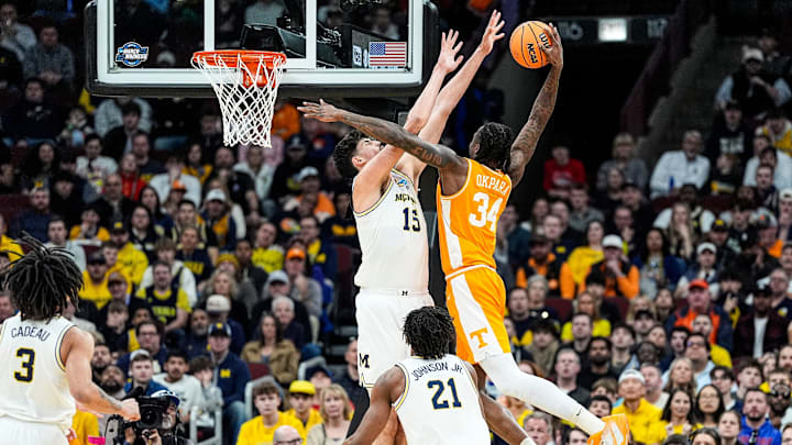 Tennessee center Felix Okpara (34) goes to the basket against Michigan center Aday Mara (15) during the first half of NCAA Tournament Elite 8 round at United Center in Chicago on Sunday, March 29, 2026. Tennessee center Felix Okpara (34) goes to the basket against Michigan center Aday Mara (15) during the first half of NCAA Tournament Elite 8 round at United Center in Chicago on Sunday, March 29, 2026.
