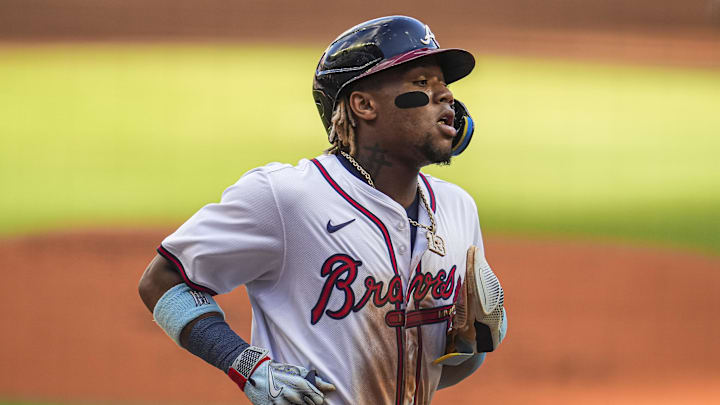 Atlanta Braves right fielder Ronald Acuna Jr. scores a run.