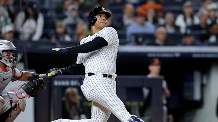 Sep 25, 2024; Bronx, New York, USA; New York Yankees right fielder Juan Soto (22) follows through on a two run home run against the Baltimore Orioles during the fifth inning at Yankee Stadium. Mandatory Credit: Brad Penner-Imagn Images