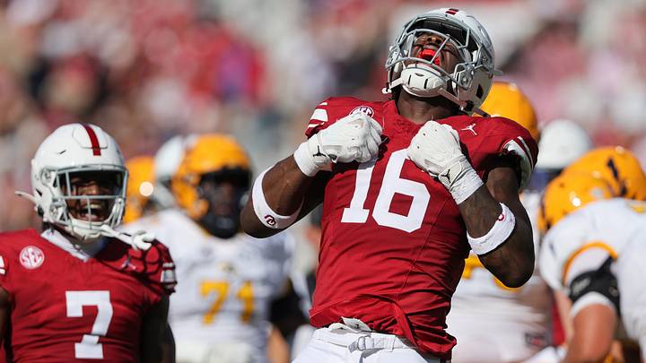 Oklahoma defensive lineman Danny Okoye celebrates after making a play against Kent State. Oklahoma defensive lineman Danny Okoye celebrates after making a play against Kent State.