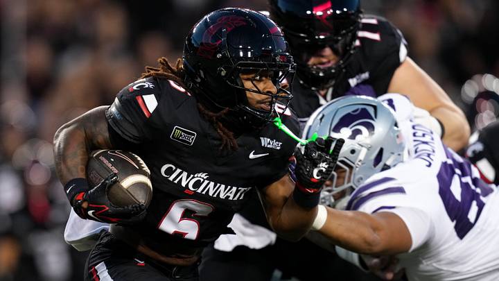 Sep 26, 2026; Cincinnati, Ohio, USA; Cincinnati Bearcats running back Gi'bran Payne (6) carries the ball against the Kansas State Wildcats in the first half at Nippert Stadium. Mandatory Credit: Aaron Doster-Imagn Images Sep 26, 2026; Cincinnati, Ohio, USA; Cincinnati Bearcats running back Gi'bran Payne (6) carries the ball against the Kansas State Wildcats in the first half at Nippert Stadium. Mandatory Credit: Aaron Doster-Imagn Images