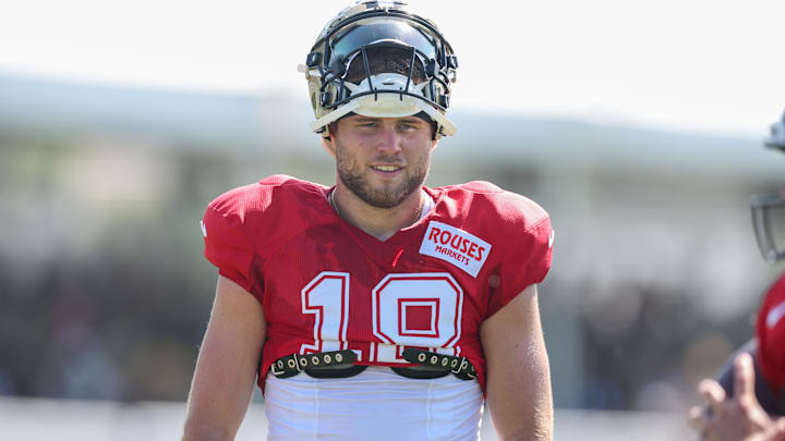 Jul 28, 2025; Metairie, LA, USA;  New Orleans Saints quarterback Hunter Dekkers (18) looks on at Ochsner Sports Performance Center. Mandatory Credit: Stephen Lew-Imagn Images