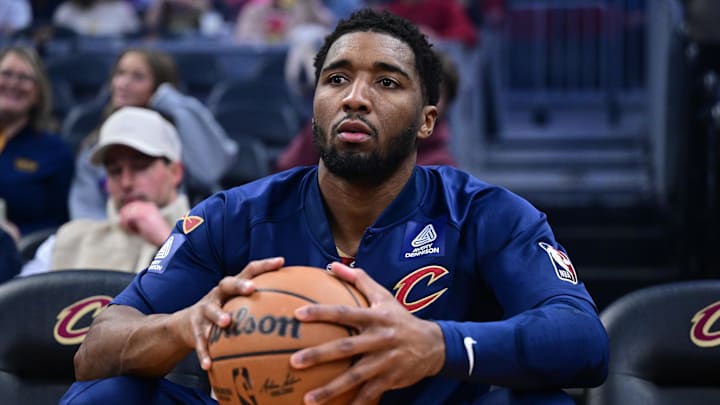 Cleveland Cavaliers guard Donovan Mitchell (45) warms up before a game against the Denver Nuggets at Rocket Arena.