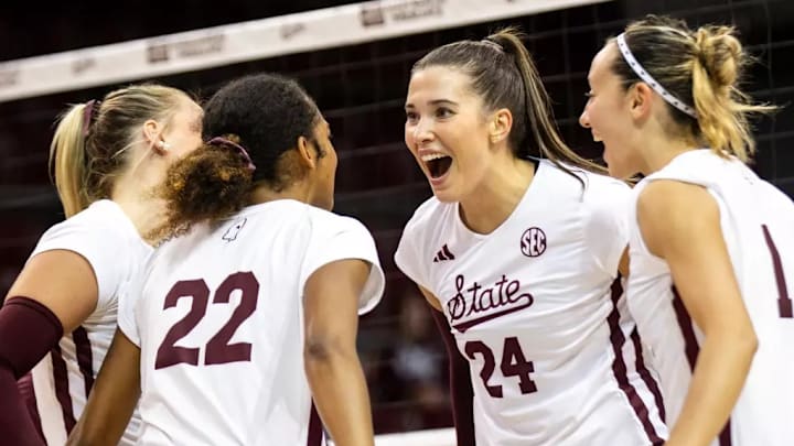 Mississippi State volleyball players celebrate during the match between the South Alabama Jaguars and the Mississippi State Bulldogs at the Newell-Grissom Building in Starkville, MS.