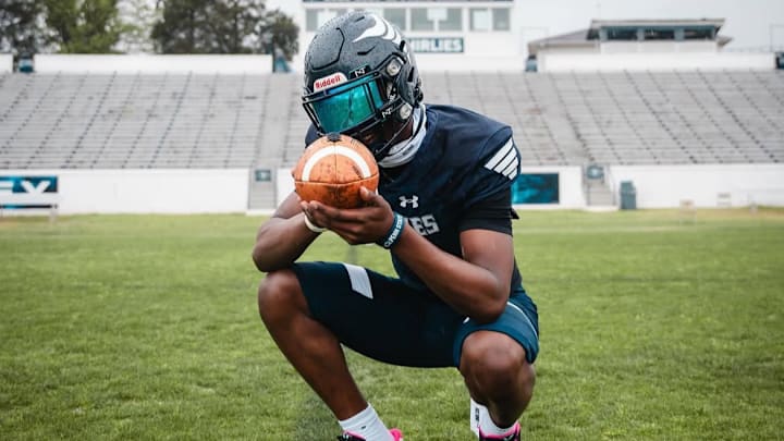 Faizon Brandon taking pictures in his Grimsley High School football jersey Faizon Brandon taking pictures in his Grimsley High School football jersey