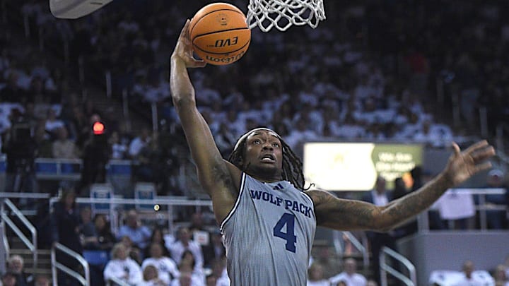 Nevada's Tre Coleman drives while taking on San Diego State at Lawlor Events Center in Reno. 