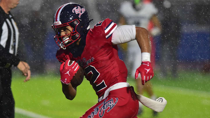 A four-star safety's commitment puts pressure on Michigan and Cal.