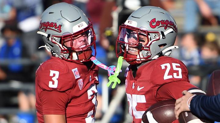 Washington State Cougars safety Jaylen Thomas (3) and Washington State Cougars safety Jackquintin Bal (25) celebrate after scoring a touchdown against the Arizona Wildcats during the first half at Gesa Field at Martin Stadium. Washington State Cougars safety Jaylen Thomas (3) and Washington State Cougars safety Jackquintin Bal (25) celebrate after scoring a touchdown against the Arizona Wildcats during the first half at Gesa Field at Martin Stadium.