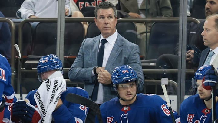 Sep 23, 2025; New York, New York, USA; New York Rangers head coach Mike Sullivan looks on during the third period of a preseason game against the Boston Bruins at Madison Square Garden. Mandatory Credit: Vincent Carchietta-Imagn Images