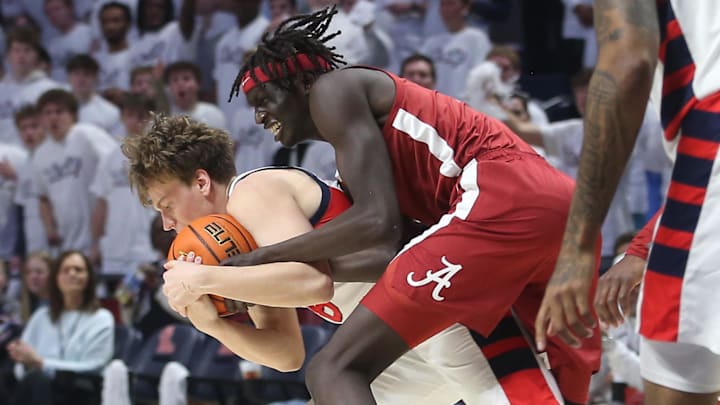Feb 11, 2026; Oxford, Mississippi, USA; Mississippi Rebels guard Eduardo Klafke (8) and Alabama Crimson Tide forward Taylor Bol Bowen (7) battle for possession during the first half at The Sandy and John Black Pavilion at Ole Miss. Mandatory Credit: Petre Thomas-Imagn Images Feb 11, 2026; Oxford, Mississippi, USA; Mississippi Rebels guard Eduardo Klafke (8) and Alabama Crimson Tide forward Taylor Bol Bowen (7) battle for possession during the first half at The Sandy and John Black Pavilion at Ole Miss. Mandatory Credit: Petre Thomas-Imagn Images