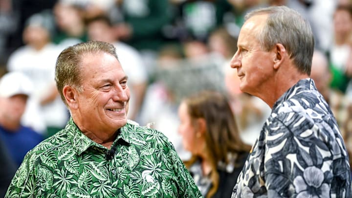 Michigan State's head coach, Tom Izzo, talks with Tennessee head coach Rick Barnes.