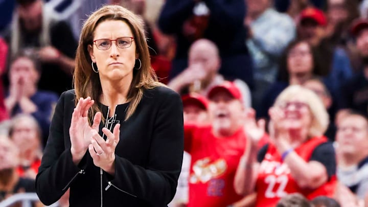 Indiana Fever head coach Stephanie White cheers for her team Saturday, June 14, 2025, during a game between the Indiana Fever and the New York Liberty at Gainbridge Fieldhouse in Indianapolis. The Indiana Fever defeated the New York Liberty, 102-88. Indiana Fever head coach Stephanie White cheers for her team Saturday, June 14, 2025, during a game between the Indiana Fever and the New York Liberty at Gainbridge Fieldhouse in Indianapolis. The Indiana Fever defeated the New York Liberty, 102-88.