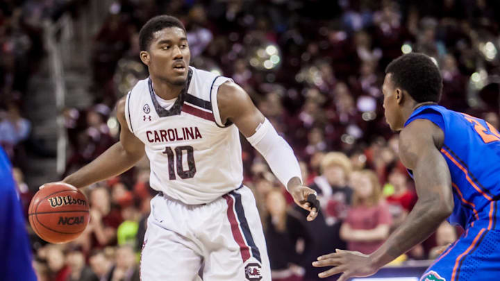 Mar 4, 2014; Columbia, SC, USA; South Carolina Gamecocks guard Duane Notice (10) looks to pass against the Florida Gators in the second half at The Colonial Life Arena. Mandatory Credit: Jeff Blake-Imagn Images