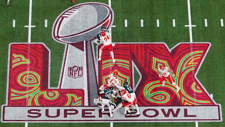 Feb 9, 2025; New Orleans, LA, USA; Kansas City Chiefs quarterback Patrick Mahomes (15) is pressured by Philadelphia Eagles linebacker Josh Sweat (19) in the second quarter during Super Bowl LIX at Caesars Superdome. Mandatory Credit: James Lang-Imagn Images