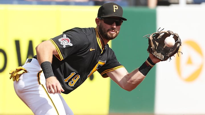 Sep 21, 2025; Pittsburgh, Pennsylvania, USA;  Pittsburgh Pirates third baseman Jared Triolo (19) fields a ground ball for an out against Athletics catcher Willie MacIver (not pictured) during the fourth inning at PNC Park. Mandatory Credit: Charles LeClaire-Imagn Images