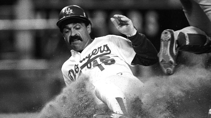 Oct 13, 1981; Los Angeles, CA; USA; FILE PHOTO; Los Angeles Dodgers base runner Davey Lopes (16) slides into 3rd base against the Montreal Expos during the 1981 NLCS at Dodger Stadium. Mandatory Credit: Jayne Kamin-Oncea-Imagn Images Oct 13, 1981; Los Angeles, CA; USA; FILE PHOTO; Los Angeles Dodgers base runner Davey Lopes (16) slides into 3rd base against the Montreal Expos during the 1981 NLCS at Dodger Stadium. Mandatory Credit: Jayne Kamin-Oncea-Imagn Images