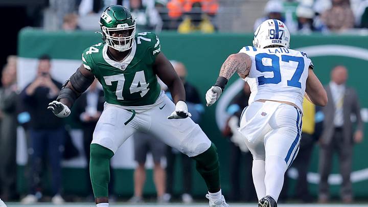 New York Jets offensive tackle Olu Fashanu (74) blocks against Indianapolis Colts defensive end Laiatu Latu (97) during the second quarter at MetLife Stadium.