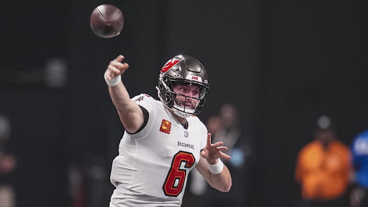Oct 3, 2024; Atlanta, Georgia, USA; Tampa Bay Buccaneers quarterback Baker Mayfield (6) passes against the Atlanta Falcons during the first quarter at Mercedes-Benz Stadium. Mandatory Credit: Dale Zanine-Imagn Images