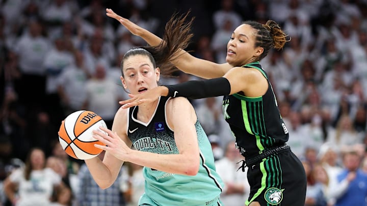 Oct 16, 2024; Minneapolis, Minnesota, USA; Minnesota Lynx forward Napheesa Collier (24) defends against New York Liberty forward Breanna Stewart (30) during the second half of game three of the 2024 WNBA Finals at Target Center. Mandatory Credit: Matt Krohn-Imagn Images Oct 16, 2024; Minneapolis, Minnesota, USA; Minnesota Lynx forward Napheesa Collier (24) defends against New York Liberty forward Breanna Stewart (30) during the second half of game three of the 2024 WNBA Finals at Target Center. Mandatory Credit: Matt Krohn-Imagn Images